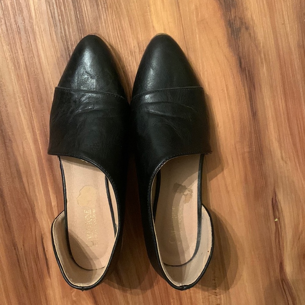 Black flats: Catherine Malandrino. Women’s size 7.
